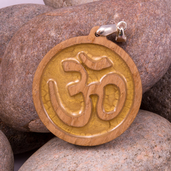 Handcrafted Bespoke Om Pendant; set in contemporary oak.| Jabbawocky Crafts (jabbawockycrafts.co.uk)